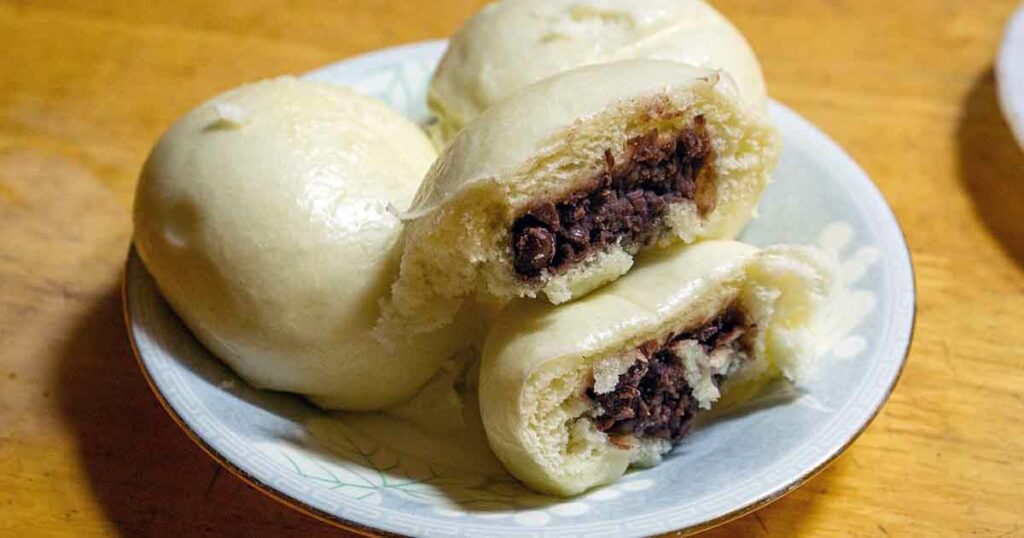 Hoppang sehen den chinesischen Dumplings zum Verwechseln ähnlich. Auch der Inhalt ist fast gleich.