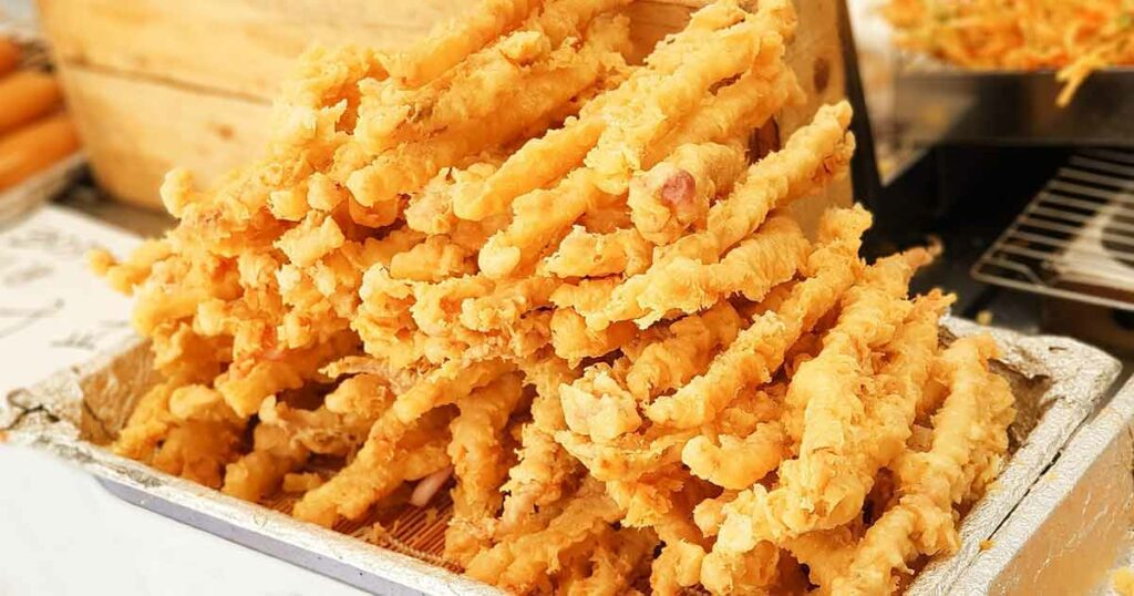 Twigim gibt es in verschiedenen Arten. Hier siehst du Tintenfische, die frittiert wurden. Gemüse, Fleisch usw. gibt es natürlich auch.